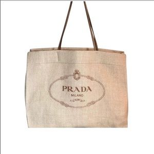 Looking for this Prada Raffia tote bag